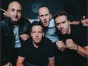 The popularity of a TikTok challenge featuring the band's hit I'm Just a Kid “probably reminded people of Simple Plan,” says guitarist Jeff Stinco, left, with singer Pierre Bouvier, drummer Chuck Comeau and guitarist Sébastien Lefebvre.