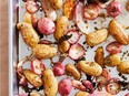 Jess Damuck roasts little potatoes and radishes on a pan greased with chive butter.