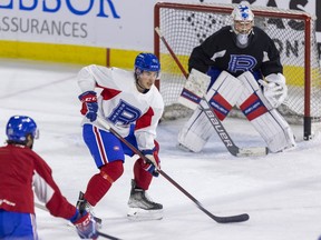 Corey Schueneman defends in front of  Cayden Primeau during Laval Rocket practice at the Place Bell Sports Complex in Laval on May 11, 2022.