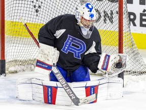 Cayden Primeau makes a save during Laval Rocket practice at the Place Bell Sports Complex in Laval on May 11, 2022.