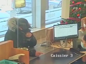 Security camera shows Nikitos Keramarios robbing the Caisse populaire Canadienne Italienne in Little Italy on Dec. 15, 2020. He was sentenced for the crime on Tuesday, May 17, 2022.  Credit: Court files