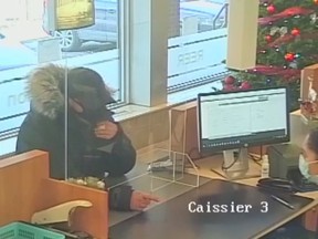 Security camera shows Nikitos Keramarios robbing the Caisse populaire Canadienne Italienne in Little Italy on Dec. 15, 2020. He was sentenced for the crime on Tuesday, May 17, 2022. Credit: Court files