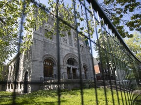 St. Gabriel's Catholic Church, a focal point for Montreal's Irish community since the late 1800s, is abandoned and crumbling. It is surrounded by a safety fence.
