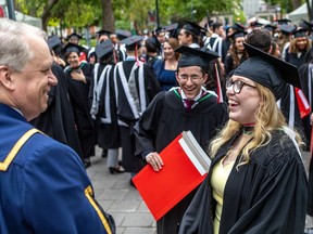 McGill law students, including aledictorian Beatrice Courchesne-Mackie, had their graduation ceremony in the convocation tent at McGill on Thursday, May 26, 2022.