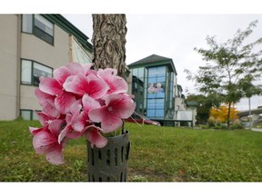 A spray of flowers outside the Herron seniors residence in Dorval on Sept. 28, 2020.