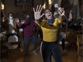Saiswari Virahsammy and other members of the Montreal Gospel Choir rehearse for their Christmas concert last year at the Church of St. John the Evangelist. The choir will give three concerts at the church on Saturday, May 7.