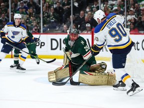 Marc-André Fleury of the Minnesota Wild defends the net against Ryan O'Reilly of the St. Louis Blues during the first period in Game 1 of playoff series at Xcel Energy Center on May 2, 2022, in St. Paul, Minn.