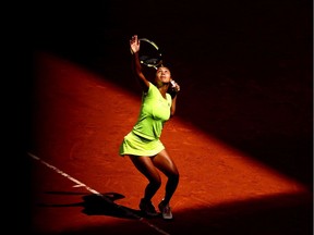 Montreal's Leylah Fernandez serves in her second round match against Jil Teichmann of Switzerland during Day 4 of the Mutua Madrid Open at La Caja Magica on Sunday, May 1, 2022, in Madrid.