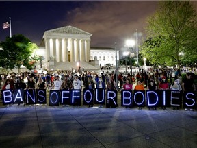 MoveOn and Abortion Access activists rally outside the Supreme Court of the United States to demand keep the #BansOffOurBodies on May 3, 2022 in Washington, DC.