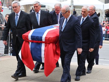Pallbearers carry Guy Lafleur's body into Mary Queen of the World Cathedral for his funeral in Montreal Tuesday May 3, 2022.