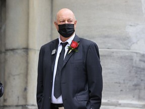 Former line mate of Guy Lafleur Steve Shutt watches the hearse with Lafleur's casket arrive at Mary Queen of the World Cathedral for his funeral.