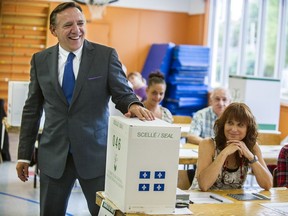 Coalition Avenir Quebec (CAQ) candidate Francois Legault votes on September 4, 2012 in l'Assomption, Quebec.