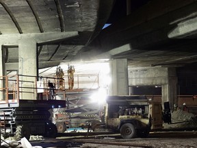 MAY 23, 2018: Work crews repair the Metropolitan Expressway’s underbelly.
