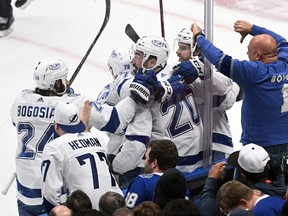 Tampa Bay Lightning forward Nick Paul (20) celebrates with teammates after scoring a goal against the Toronto Maple Leafs in game seven of the first round of the 2022 Stanley Cup Playoffs at Scotiabank Arena on Saturday, May 14, 2022.