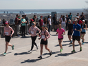 Nurses, from the left, Sarah Bachand, Mélanie Myrand and Natalia Mursa, with supporters, arrive at Mount Royal Belvedere after a 50 km run that linked nine hospitals and three CHLSDs in Montreal to recognize the work of nurses and raise awareness of the importance to preserve their mental health. The event will mark the end of Mental Health Week and kick off National Nursing Week, which will take place May 9-15, 2022. Nurse Sonia Brown, who died in March 2021, was honoured as part of the event. 