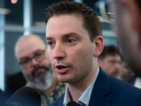 Quebec Justice Minister Simon Jolin-Barrette responds to reporters questions as he arrive for the Coalition Avenir Quebec annual congress in Drummondville on Saturday, May 28, 2022.