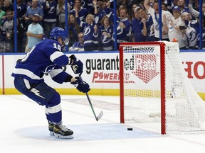 Tampa Bay Lightning left wing Ondrej Palat (18) scores an empty net goal against the Florida Panthers during the third period at Amalie Arena in Tampa on May 23, 2022.