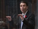 François Bonnardel responds during question period Tuesday, Nov. 2, 2021 at the legislature in Quebec City. A Quebec government program offering discounted flights to the province's remote regions will begin Wednesday, the transport minister said as he announced details of the plan.