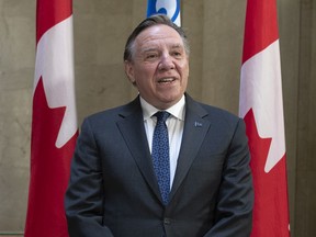 "It's not normal" for political parties to accept candidates who are against abortion rights, Premier François Legault says.
