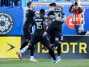 CF Montreal players celebrate a goal by Joaquin Torres (10) against Atlanta United during second half MLS soccer action in Montreal on April 30, 2022.
