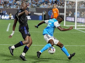 CF Montréal's Kamal Miller defends against Charlotte FC's Harrison Afful during the second half at Bank of America Stadium in Charlotte, N.C., on May 14, 2022.