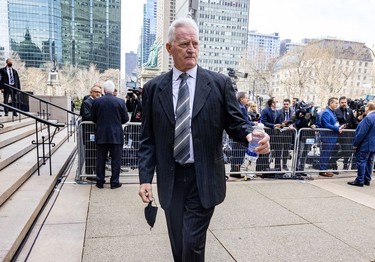 Former teammate Larry Robinson arrives for the funeral for Guy Lafleur at Mary Queen of the World Cathedral in Montreal Tuesday, May 3, 2022.