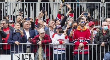 Fans line René-Lévesque Blvd. to watch the funeral for Guy Lafleur at Mary Queen of the World Cathedral in Montreal on Tuesday, May 3, 2022.