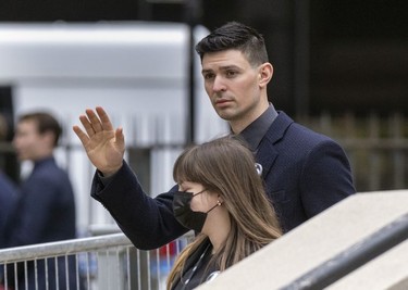 Montreal Canadiens goalie Carey Price waves to fans outside the funeral for Guy Lafleur at Mary Queen of the World Cathedral in Montreal Tuesday May 3, 2022.