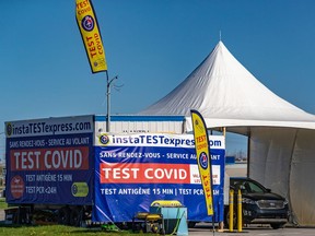 A drive-through COVID 19 testing center at the Galleries des Sources in Dollard-des-Ormeaux on May 5, 2022.