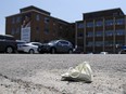 A discarded mask lies in the parking lot of Belleville General Hospital. We may think we are finished with COVID, but it is not finished with us.