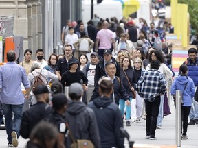 HUSTLE AND BUSTLE: Shoppers and pedestrians flooded Ste-Catherine St. yesterday as the city’s downtown core continues to show signs of resuscitation after more than two years of struggles during the pandemic.