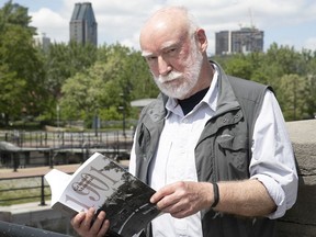 Author Robert Wilkins with his book: Grandad's Montreal 1901 at the Lachine Canal on Thursday.