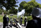 The Westmount Battery fires a refurbished cannon dating from 1810 to salute Queen Elizabeth's Platinum Jubilee on the grounds of the Mount Royal Cemetery in Montreal, on Saturday, June 4, 2022. 