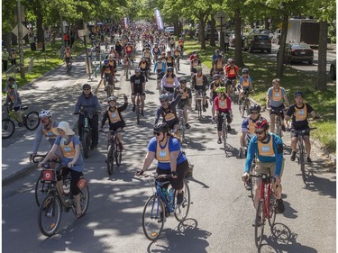 People start off from Lafontaine Park as they took part in the Tour de l'Île in Montreal on Sunday, June 5, 2022.