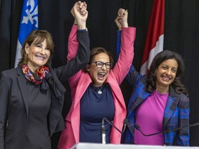 Dérisée McGraw is flanked by outgoing MNA Kathleen Weil, left, and Quebec Liberal Party Leader Dominique Anglade after being introduced as the candidate in the  Notre-Dame-de Grâce riding on Monday.