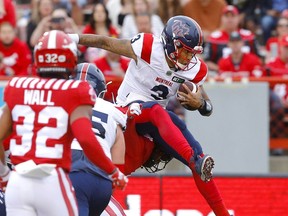 Alouettes quarterback Vernon Adams Jr. scores in the second quarter with the leaping TD against the Stampeders at McMahon stadium in Calgary on Thursday night.