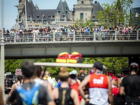 Spectators cheer on the runners during the recentTamarack Ottawa Race Weekend. It feels like life is slowly getting back to normal.