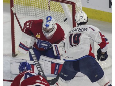 Mackenzie MacEachern of the Springfield Thunderbirds scores  against Cayden Primeau of the Laval Rocket in the first period of Game 4 of their Calder Cup Eastern Conference AHL final at Place Bell in Laval on Friday, June 10, 2022.
