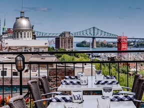 Auberge du Vieux-Port, arguably the first hotel in modern-day Old Montreal, is marking its 25th year.  Here, the view from the roof-top. PHOTO