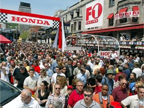 Good luck squeezing through. The crowds descend on Crescent St. during Grand Prix festivities.