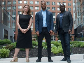 Bloc Montréal leader Balarama Holness flanked by newly announced candidates Heidi Small and Joel DeBellefeuille