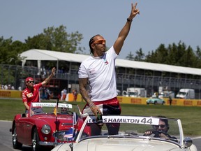 Mercedes driver Lewis Hamilton of Britain waves to the crowd during the drivers' parade at the Canadian Grand Prix at Circuit Gilles-Villeneuve in Montreal on June 9, 2019.