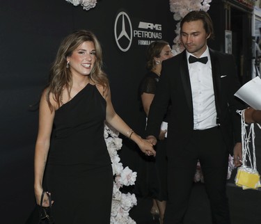 Singer Brittany Kennell arrives at the Grand Prix Party at the Ritz-Carlton Hotel in Montreal Friday, June 17, 2022 with boyfriend Scott Burstall.