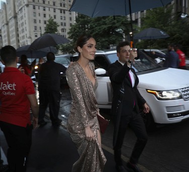 Stéphanie Boulay of Groupe Stephanie B arrives in a heavy rain at the Grand Prix Party at the Ritz-Carlton Hotel in Montreal on June 17, 2022.