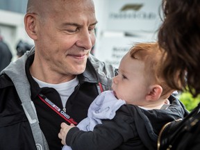 Former World Champion and proud father Jacques Villeneuve with his 5-month-old son Gilles during the Formula One Canadian Grand Prix at Circuit Gilles-Villeneuve on Ile Notre-Dame in Montreal on Saturday June 18, 2022.
