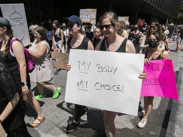 Montrealers take part in a pro-choice protest outside Palais de Justice on Sunday, June 26, 2022. The protest was in response to the U.S. Supreme Court overturning Roe v. Wade on Friday.