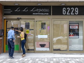 A sign in the window, announcing the store's closing, thanks customers for their loyalty and says the family will "miss being part of the beautifully revitalized Plaza St-Hubert."