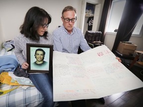 Larry Fairholm and ex-wife Tracy Wing in their son Riley's bedroom in Lac Brome in 2018, with a card signed by his friends after he was killed by the Sûreté du Québec officers.