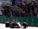 Red Bull's Max Verstappen takes the checkered flag at the Azerbaijan Grand Prix for his fifth win of the 2022 Formula One season.