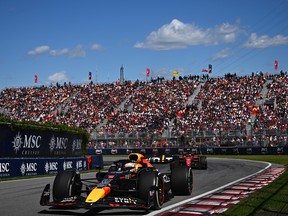 Max Verstappen's Red Bull leads Carlos Sainz's Ferrari during the Canadian Grand Prix at Circuit Gilles-Villeneuve on June 19, 2022, in Montreal.
